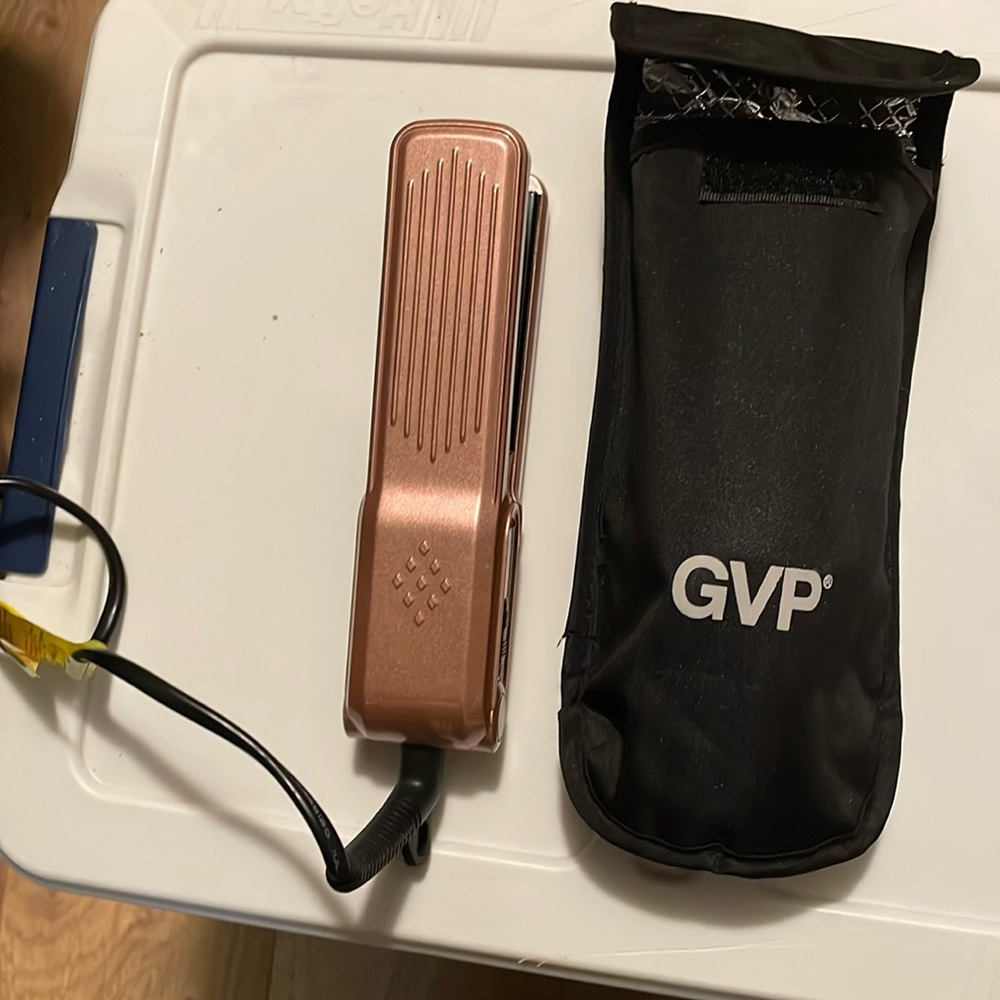 GVP Compact Ceramic Flat Iron with heat bag.